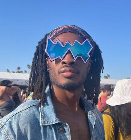 Starscream the Giant wearing purple, zigzag sunglasses